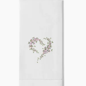 Henry Handwork white linen hand towel with embroidered pink floral heart wreath motif.