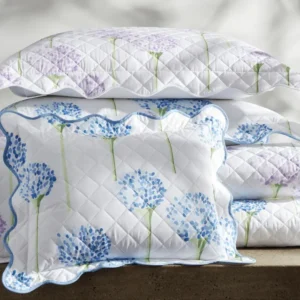 Matouk Charlotte Quilt Items in a stack