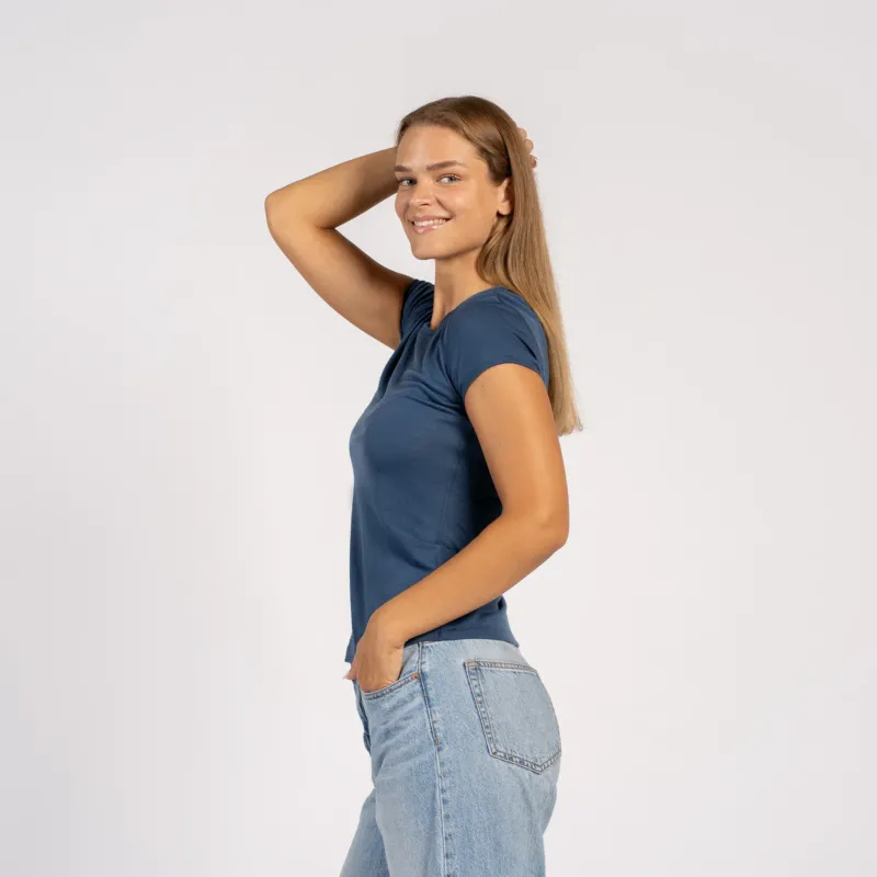 Side view of model wearing denim Merino T-shirt – soft lightweight wool tee